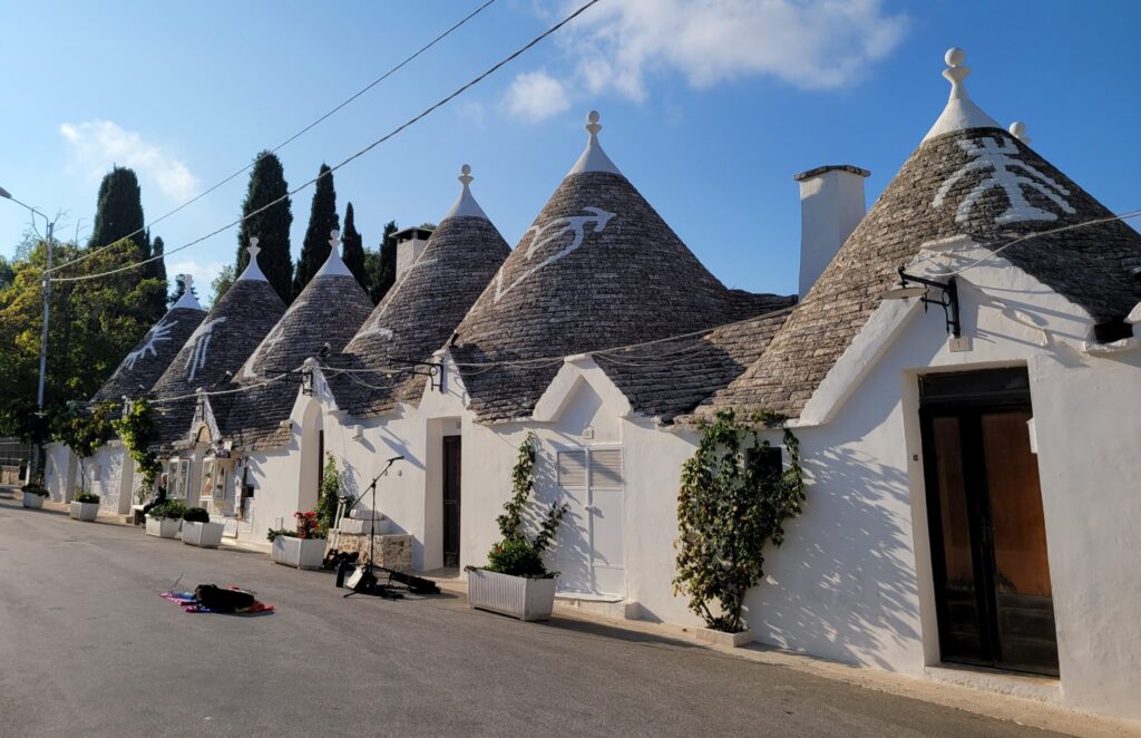 Alberobello trulli with symbols